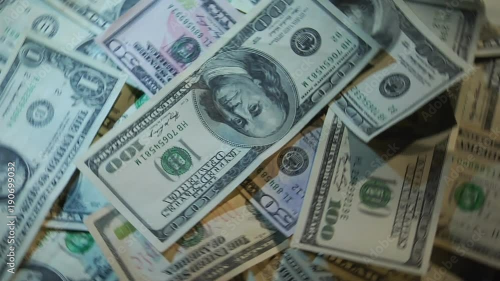 Money of different countries are circling around a close-up loop Money of different countries are circling around a close-up loop