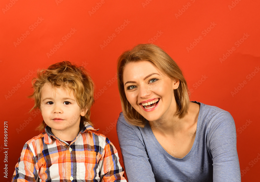 Parenthood and game concept. Woman and boy play Parenthood and game concept. Woman and boy play