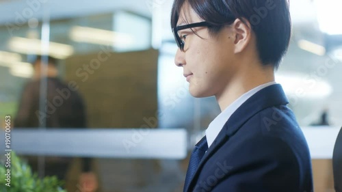 Wallpaper Mural In the Office Portrait of the East Asian Businessman Working on the Desktop Personal Computer. Torontodigital.ca
