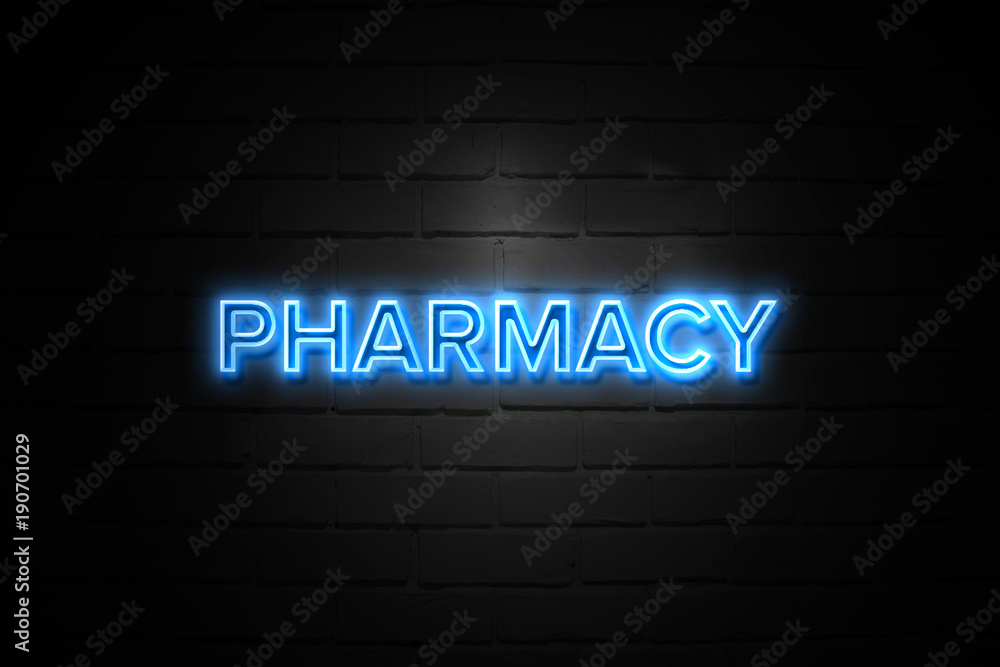 Pharmacy neon Sign on brickwall Pharmacy neon Sign on brickwall