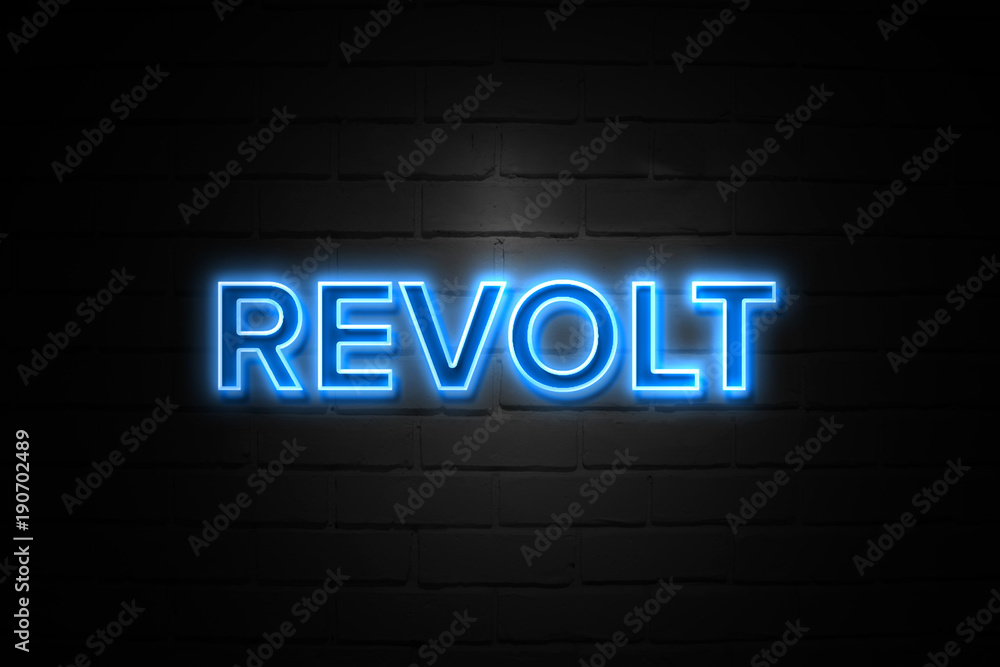 Revolt neon Sign on brickwall