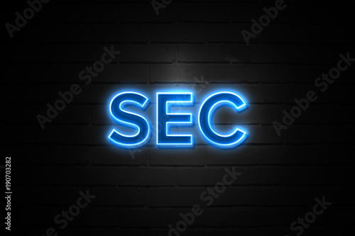Sec neon Sign on brickwall
