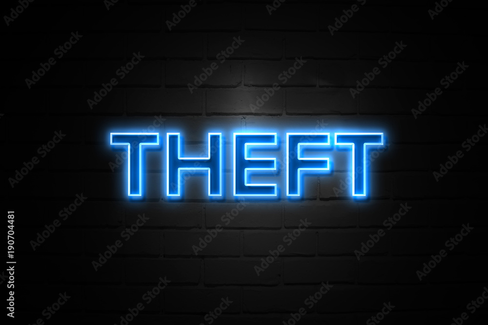 Theft neon Sign on brickwall Theft neon Sign on brickwall