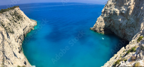 Aerial panoramic view over the blue sea of Porto Katsiki in Lefkada island, in summer holiday