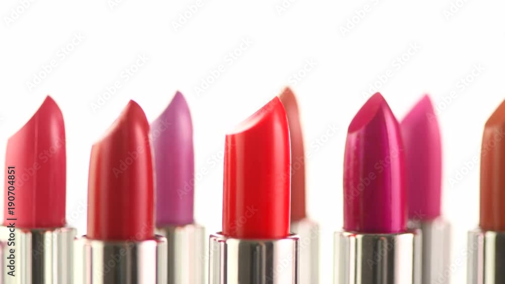 Lipstick tints palette. Fashion colorful lipsticks rotated over white background. Professional makeup and beauty. 4K UHD video footage. 3840X2160 Lipstick tints palette. Fashion colorful lipsticks rotated over white background. Professional makeup and beauty. 4K UHD video footage. 3840X2160