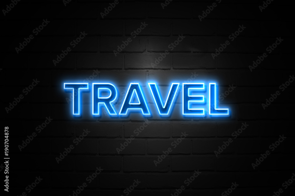 Obraz premium Travel neon Sign on brickwall