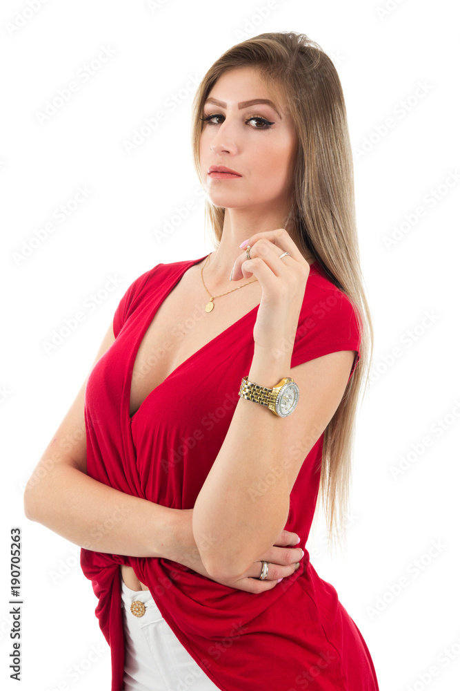 Half profile of woman looking at the camera. Blonde person and wearing red clothes. Isolated. Half profile of woman looking at the camera. Blonde person and wearing red clothes. Isolated.