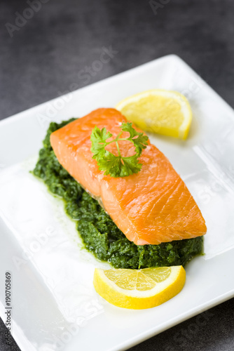 salmon on spinach