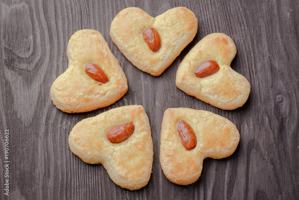 homemade cookies in the shape of heart,biscuits homemade festive,St. Valentine's Day,Valentine's Day,The 14th of February,March 8,International Women's Day on March 8,homemade baking,biscuits with alm