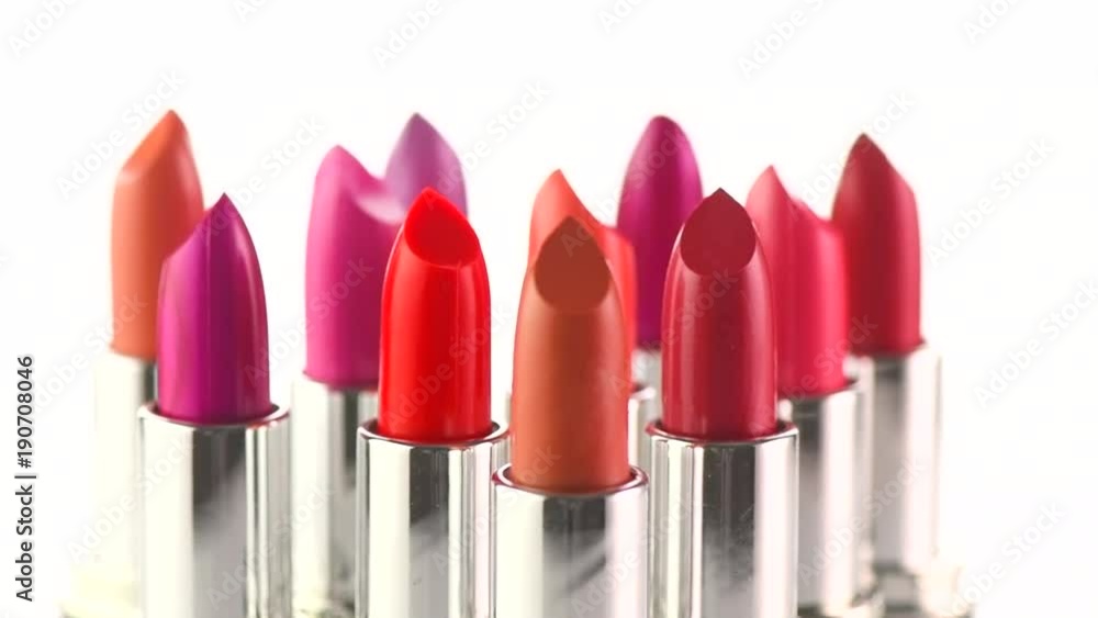 Lipstick tints palette. Fashion colorful lipsticks rotated over white background. Professional makeup and beauty. 4K UHD video footage. 3840X2160 Lipstick tints palette. Fashion colorful lipsticks rotated over white background. Professional makeup and beauty. 4K UHD video footage. 3840X2160