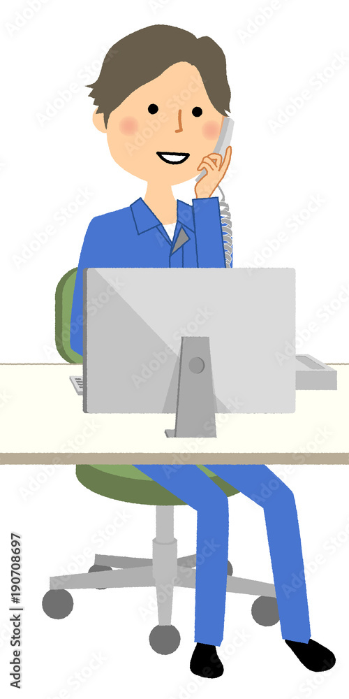 作業服の男性　PCと電話