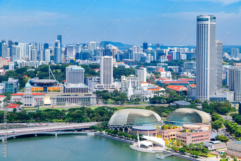 Obraz premium Singapore city skyline landscape at day blue sky. Marina Bay view. Urban skyscrapers cityscape