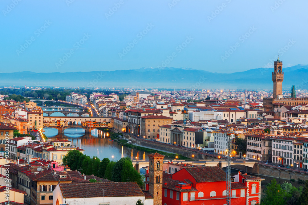 Beautiful views and peace of Florence cityscape in the background Ponte Vecchio bridge at sunset