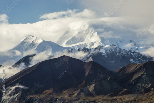 Mt. Denali rises above the smaller mountains in Alaska.