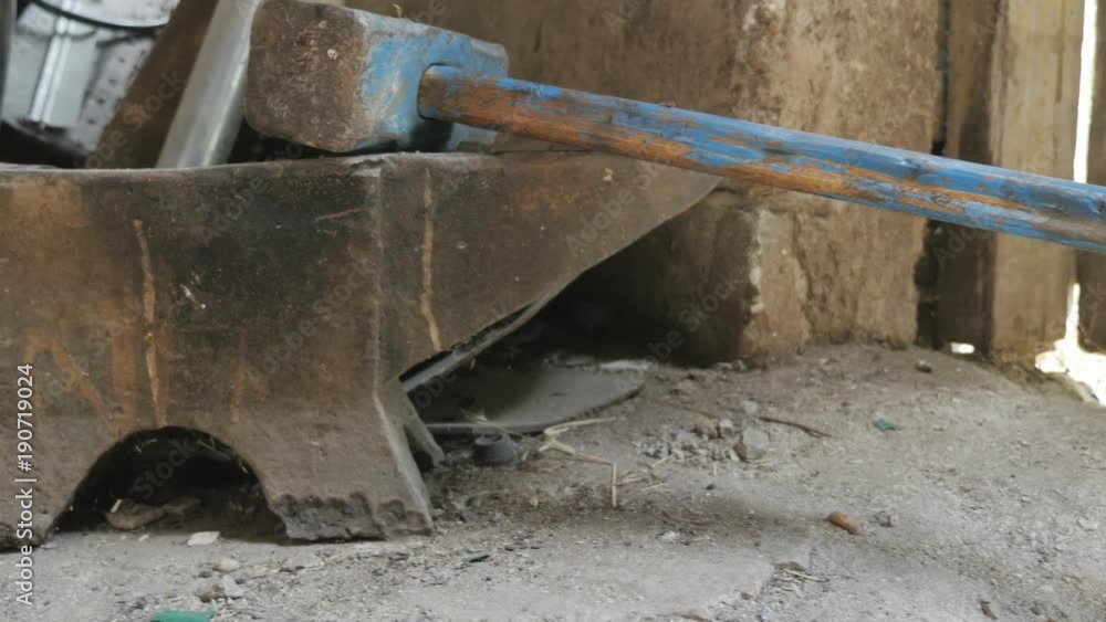 Blacksmith hammer rests on anvil
Blacksmith hammer rests on anvil