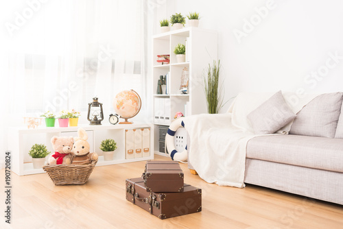 kid playroom with toy and vintage suitcase