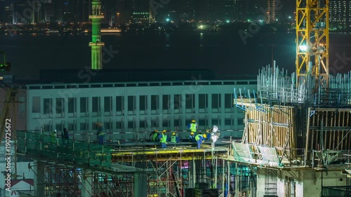 Doha construction building work workers skycreapers timelapse video crane moving Qatar, Middle East photo