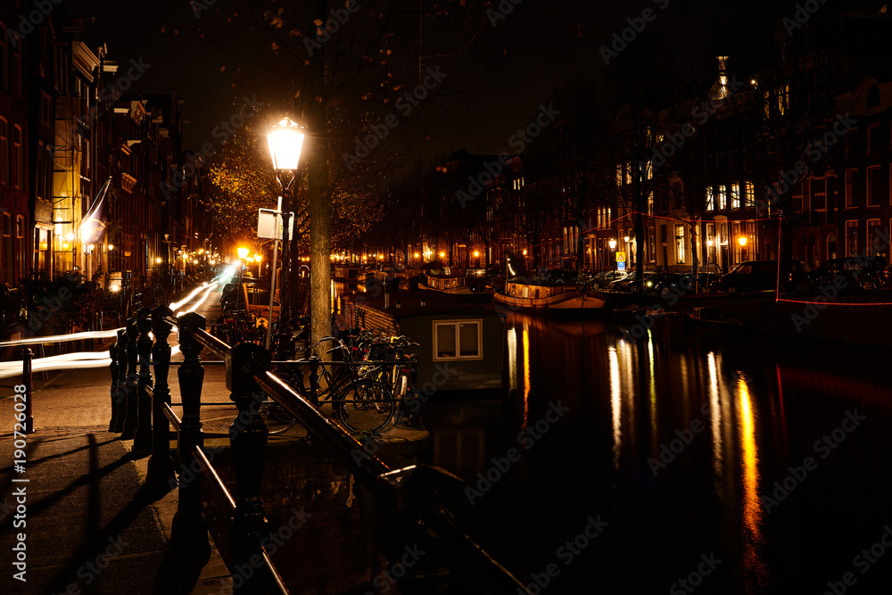 Beautiful Amsterdam city at the evening time. Amsterdam, Netherlands.