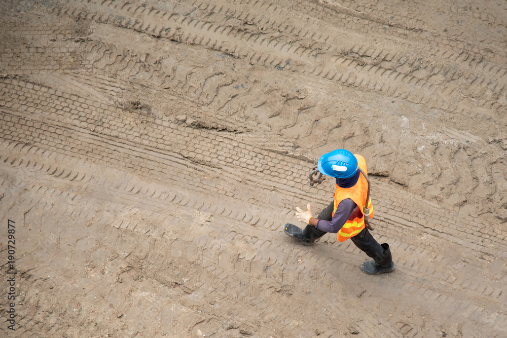 aerial view of construction worker in construction site aerial view of construction worker in construction site