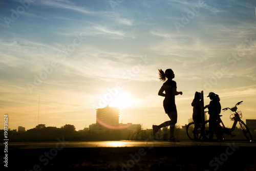 young healthy lifestyle woman running at sunrise