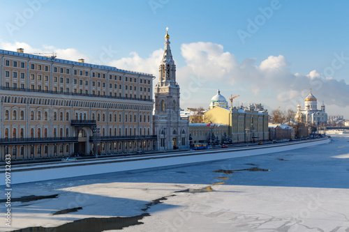 Moskva river in sunny winter day. View of the Sofiyskaya Embankment