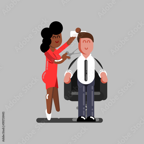 Hair dresser cuts clients hair
