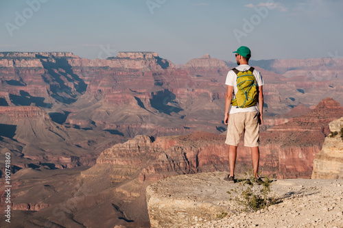 Tourist with backpack at Grand Canyon