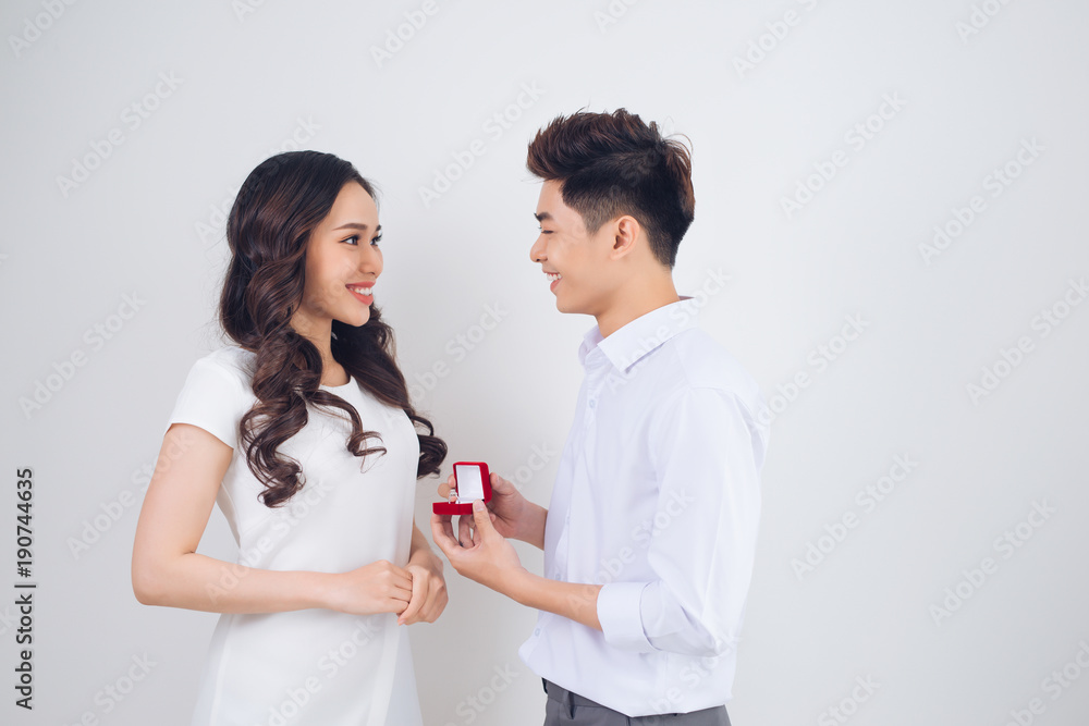Handsome man showing engagement diamond ring to his girlfriend. Proposed wedding. Handsome man showing engagement diamond ring to his girlfriend. Proposed wedding.