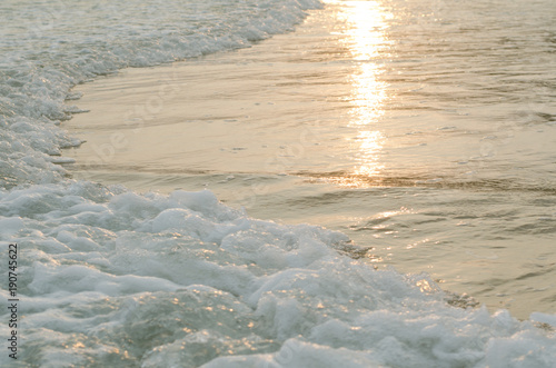 waves at sunset