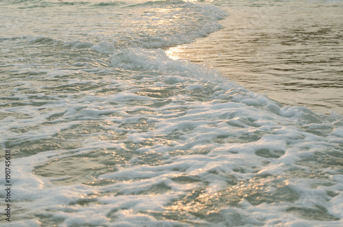 waves at sunset