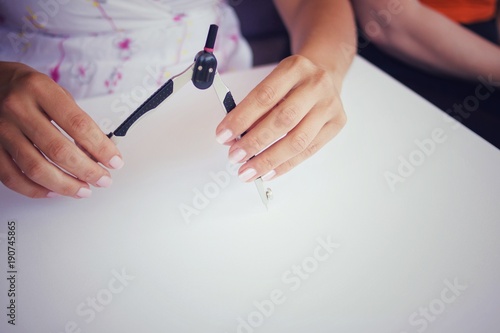 A woman uses a drawing tool