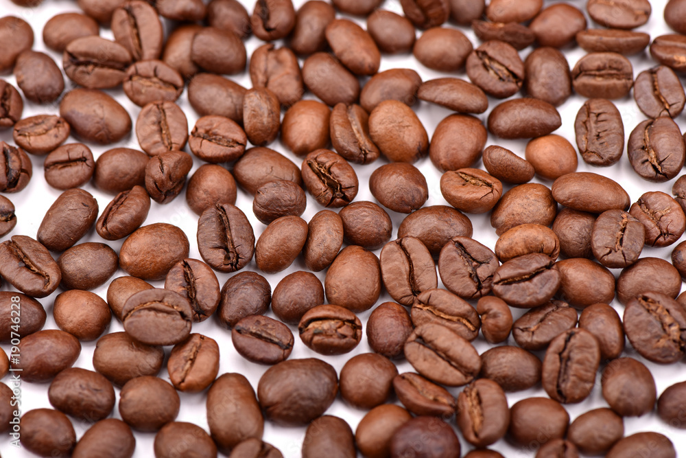 Naklejka premium Roasted coffee beans, can be used as a background.