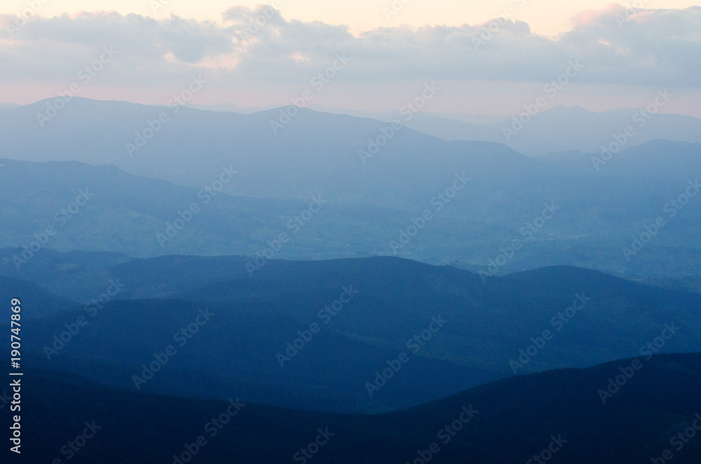Photo of the mountains after sunset.