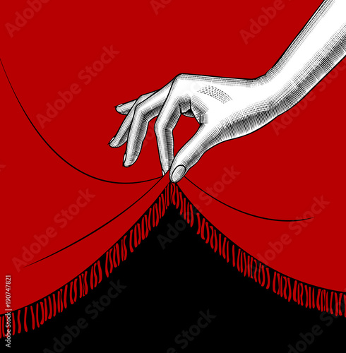 Hand of woman lifting the edge of the red curtain