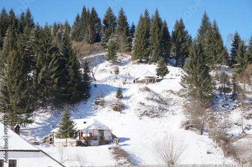 Snowy mountain landscape with house