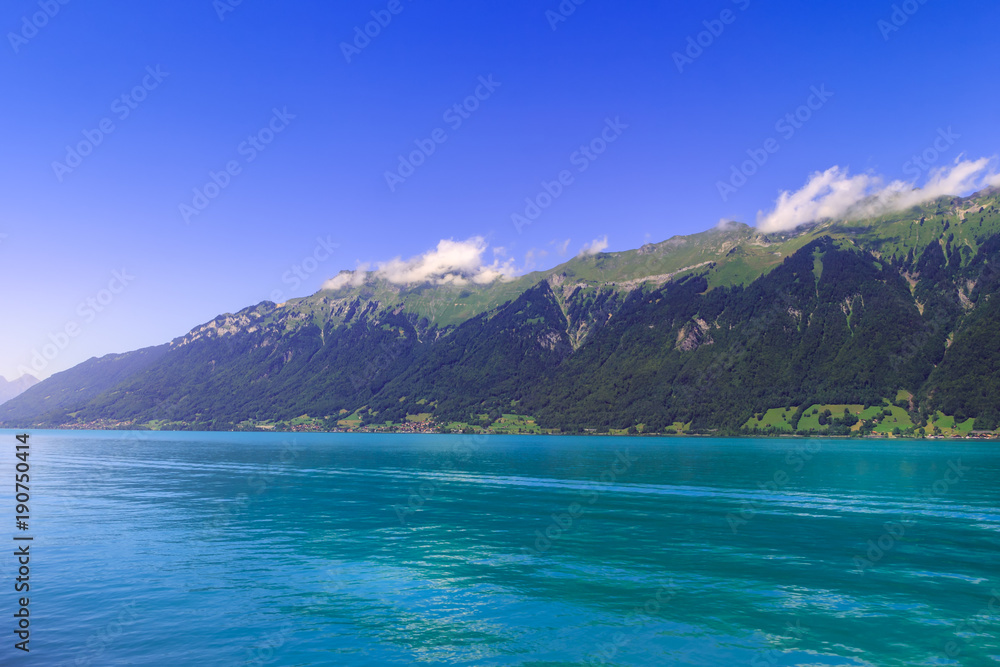 Lake Brienzersee on a beautiful bright day in the summer. Interlaken, Switzerland