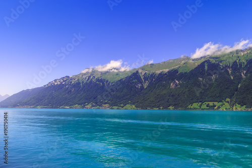 Lake Brienzersee on a beautiful bright day in the summer. Interlaken, Switzerland © Steven