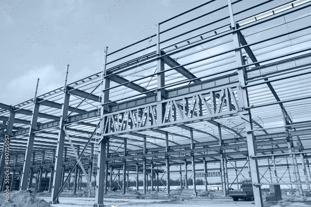 In the construction site, steel structure is under construction In the construction site, steel structure is under construction