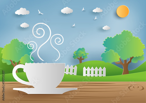 Morning coffee on wooden table with beautiful view background,paper art style.