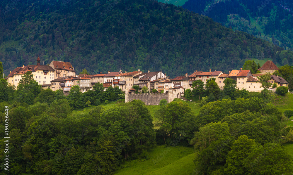Gruyeres, Switzerland - June 10, 2016: Idyllic Medieval the small Castle Swiss Village Gruyeres, Switzerland