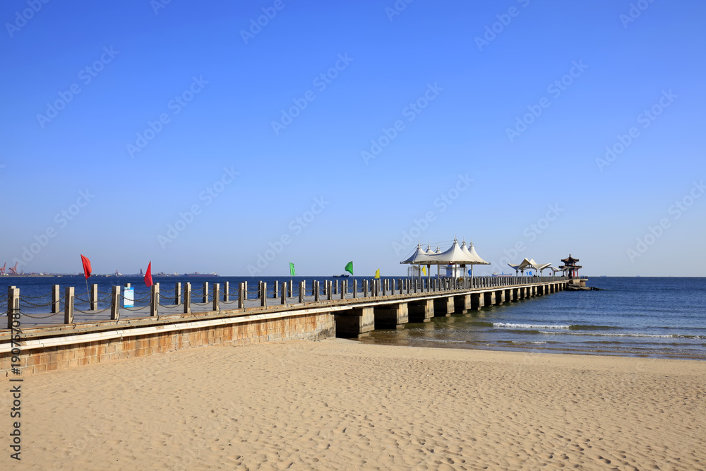The seaside scenery and the seaside pier