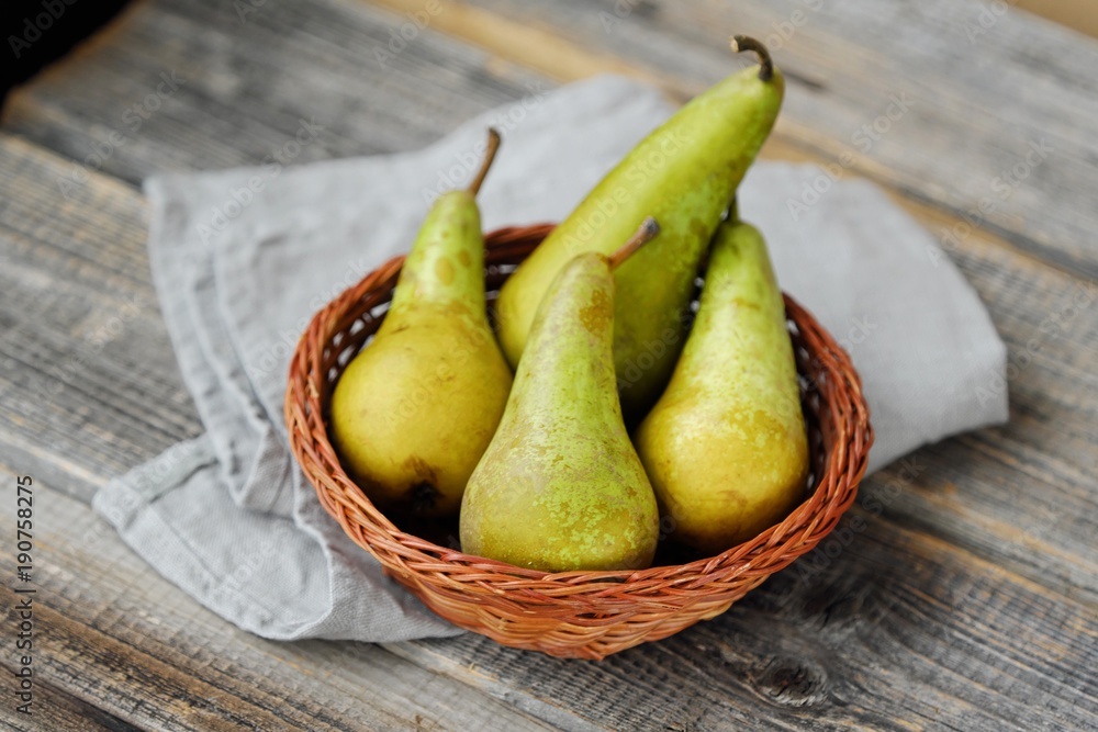 Fresh ripe green pears on the table Fresh ripe green pears on the table