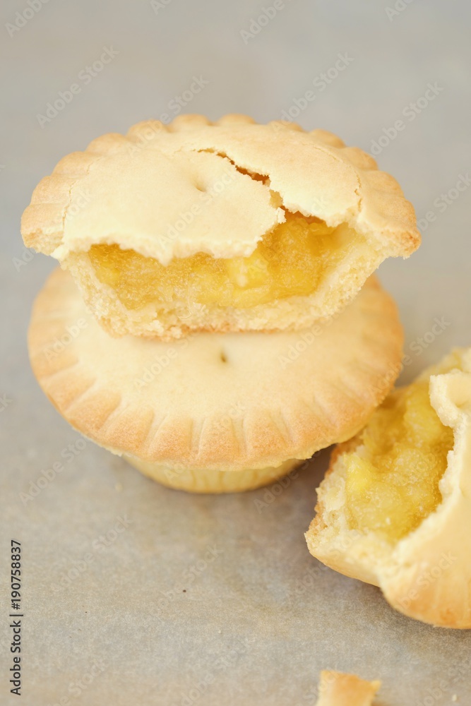 Delicious muffins with pineapples on the table Delicious muffins with pineapples on the table