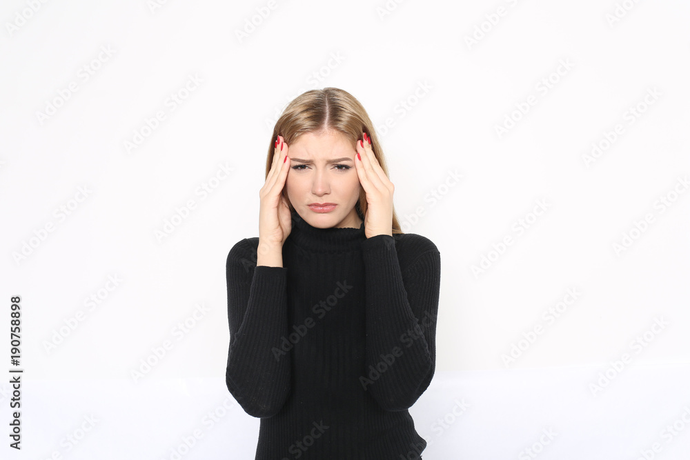 Pretty blond woman with headache Pretty blond woman with headache