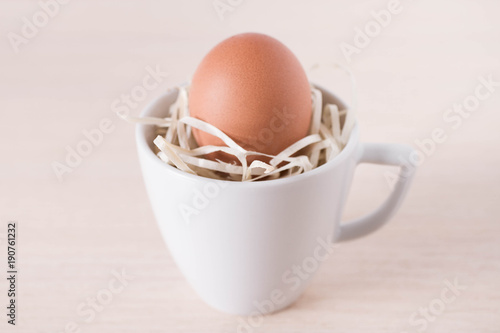 Egg in cup - symbol of life. Easter egg