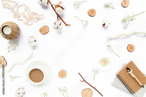 Blogger or freelancer workspace frame of coffee mug, accessories on white background. Flat lay, top view minimalistic brown styled home office desk. Beauty blog concept. © K.Decor