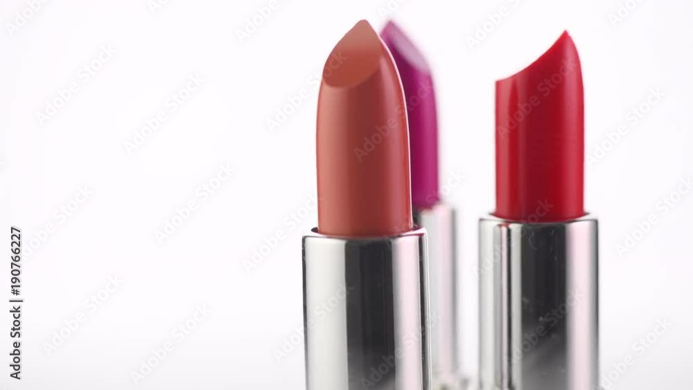 Lipstick tints palette. Fashion colorful lipsticks rotated over white background. Professional makeup and beauty. 4K UHD video footage. 3840X2160 Lipstick tints palette. Fashion colorful lipsticks rotated over white background. Professional makeup and beauty. 4K UHD video footage. 3840X2160