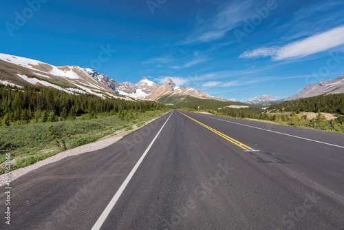 Scenic road and Canadian Rockies on Icefields Parkway. 