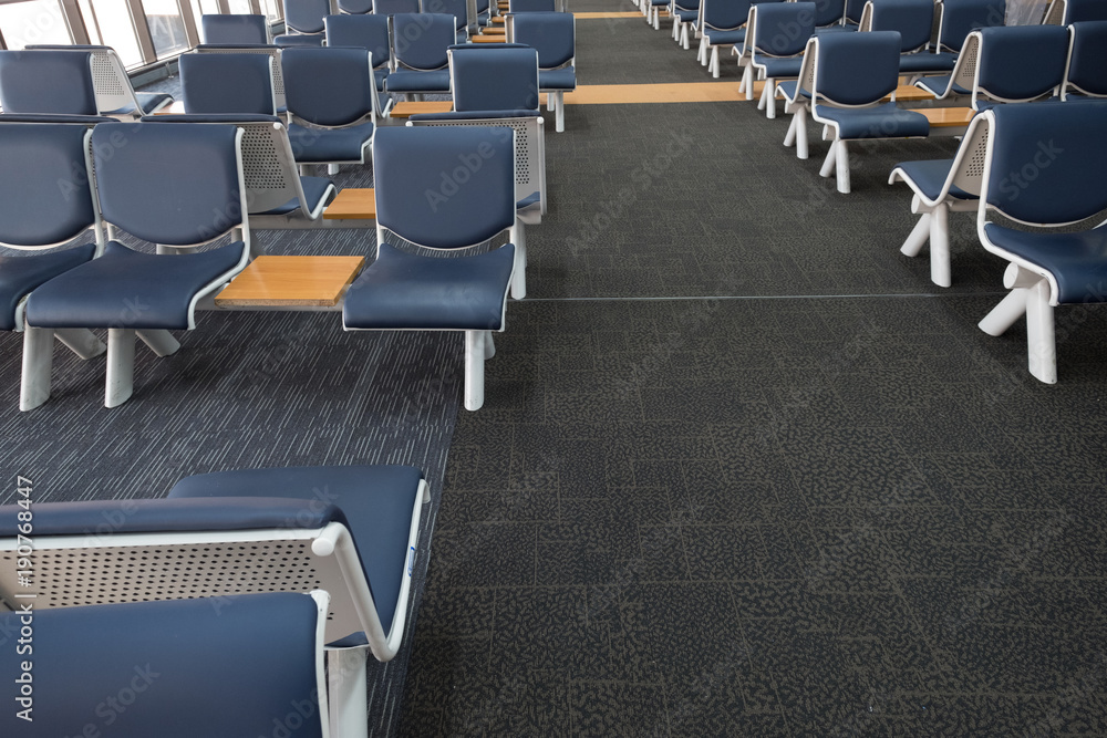 Naklejka premium Empty airport terminal waiting area with chairs lounge with seats in the airport