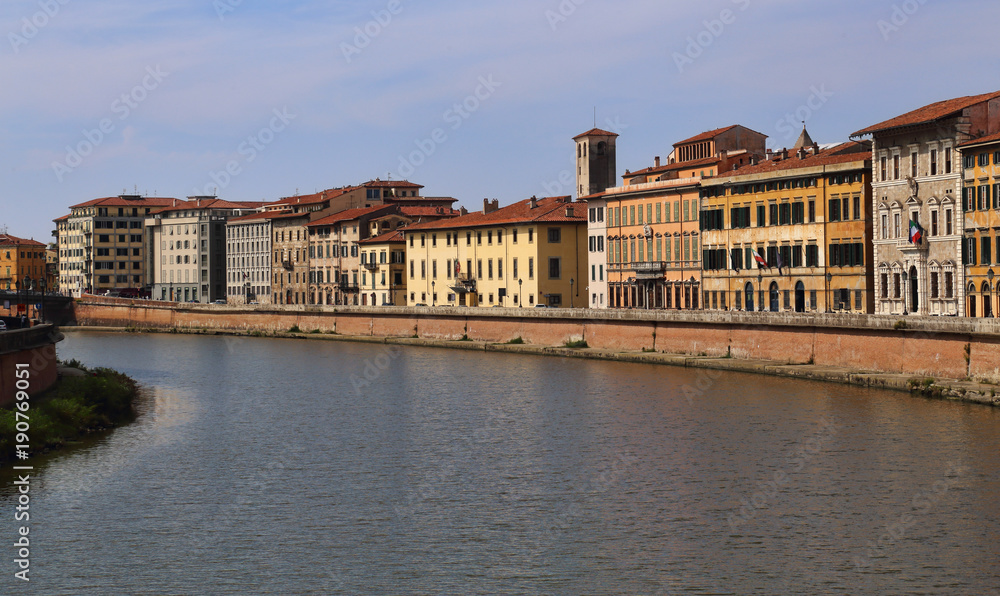 Historical buildings along the Arno river in Pisa, Italy